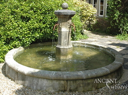 antique courtyard fountain out of stone